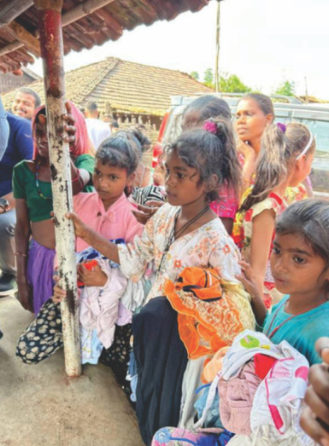 Children receiving clothes
