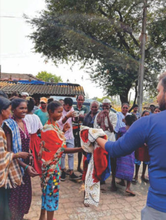 Villagers receiving clothes