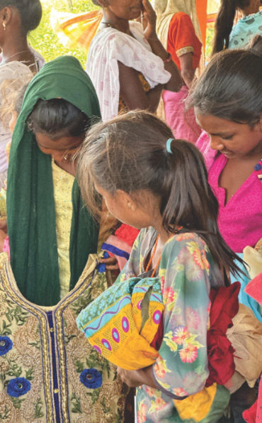 Girls looking through clothes